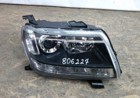 3512065JB2000 Suzuki faro derecho