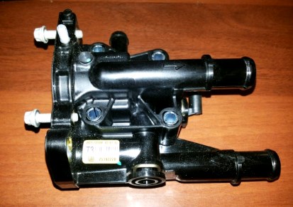 Caja termostato Opel 1338177