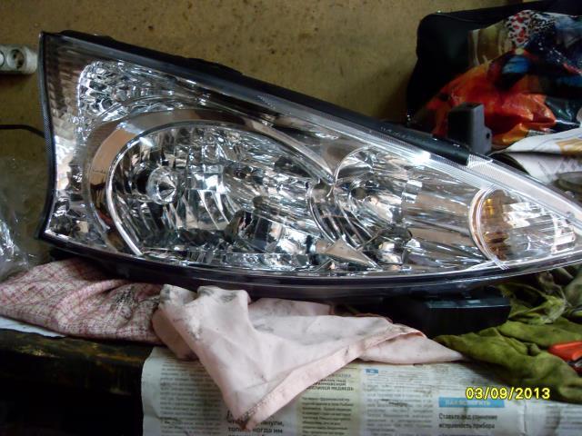 8301A545 Chrysler faro izquierdo