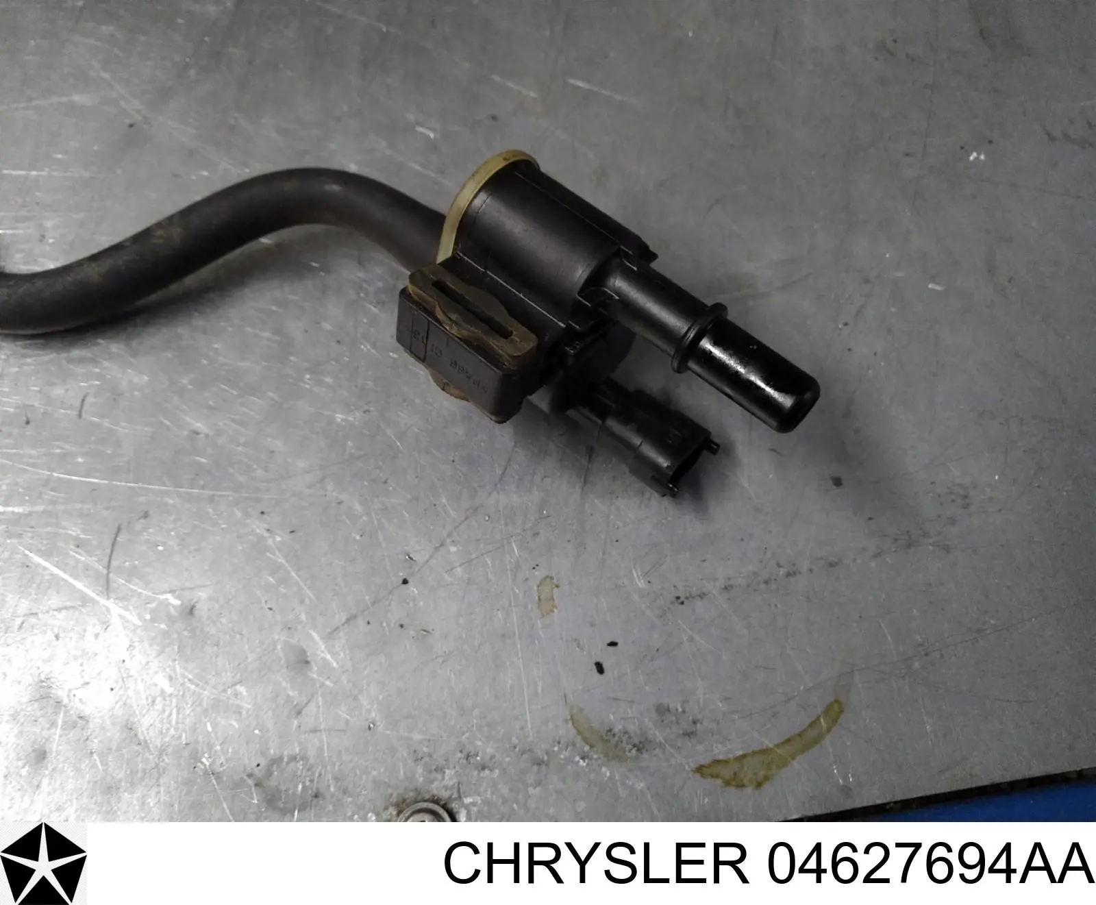 04627694AA Chrysler valvula de adsorcion de vapor de combustible