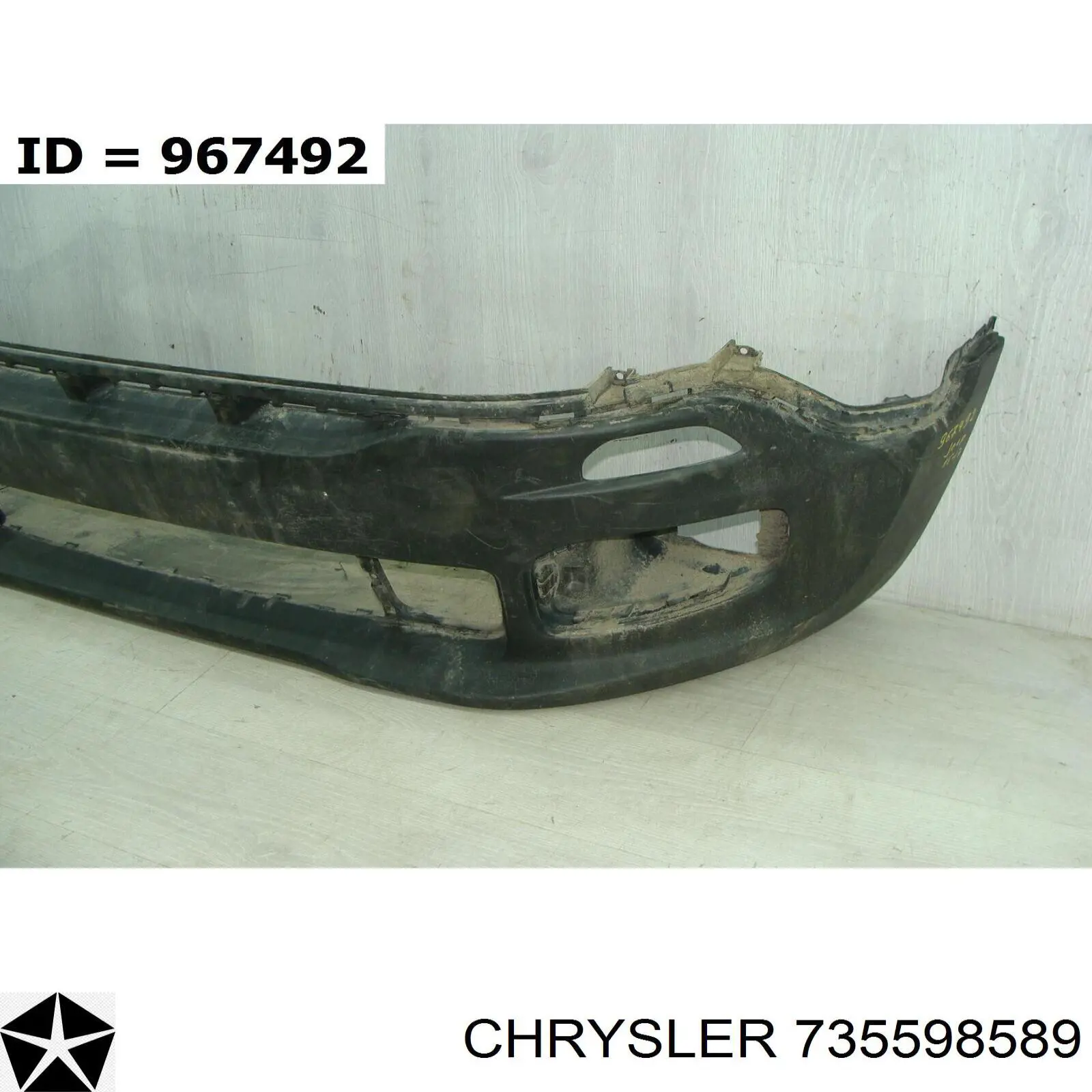 735598589 Chrysler parachoques delantero