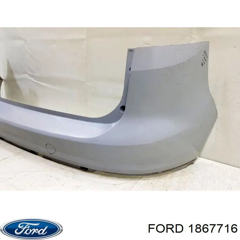 1867716 Ford Defensa trasero