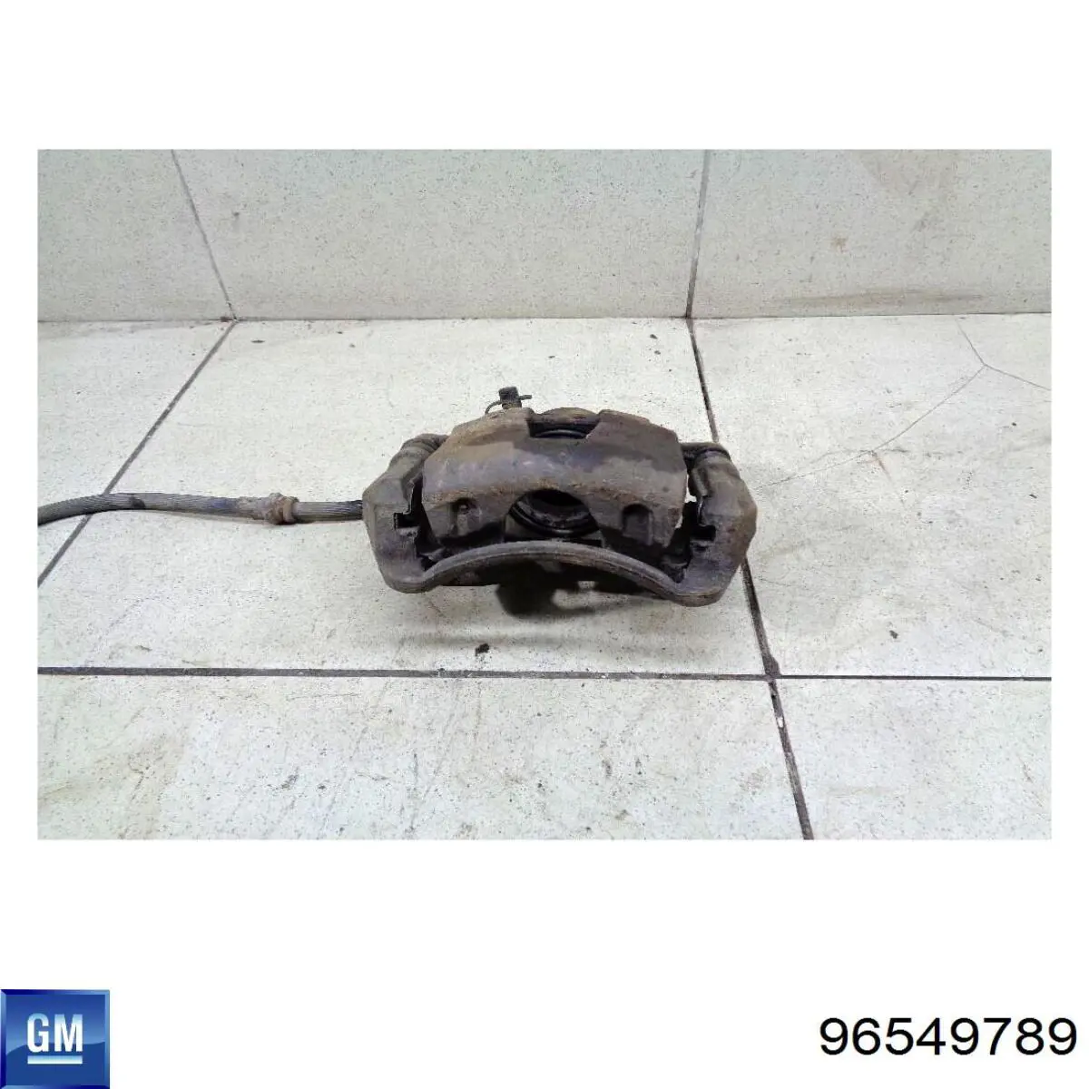 Pinza de freno delantera derecha 96549789 General Motors