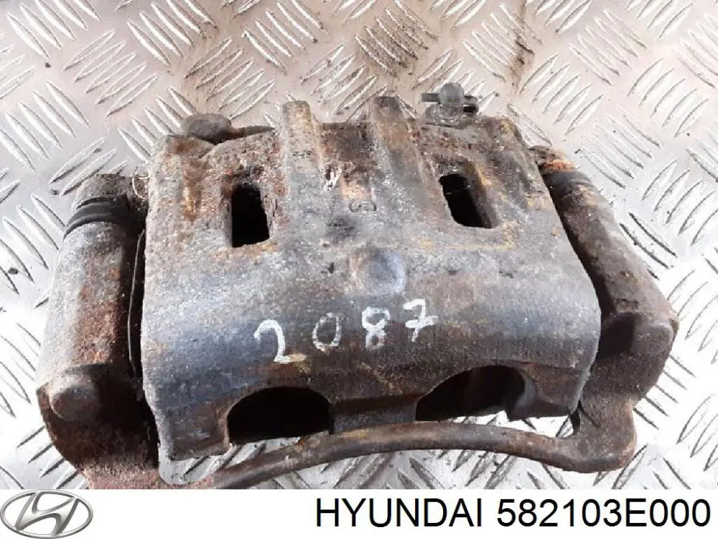 Pinza de freno trasera izquierda 582103E000 Hyundai/Kia