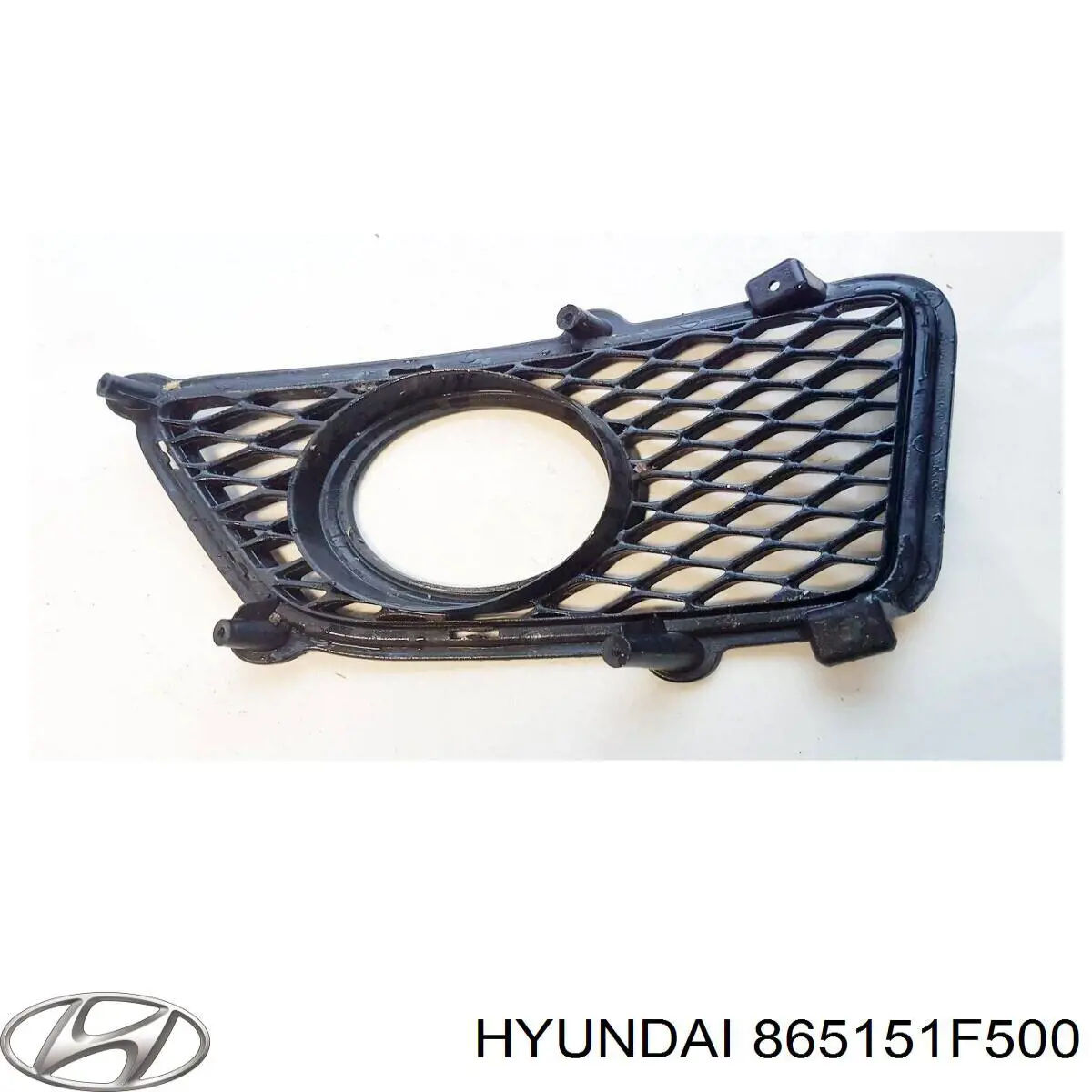 865151F500 Hyundai/Kia rejilla de ventilación, parachoques trasero, izquierda