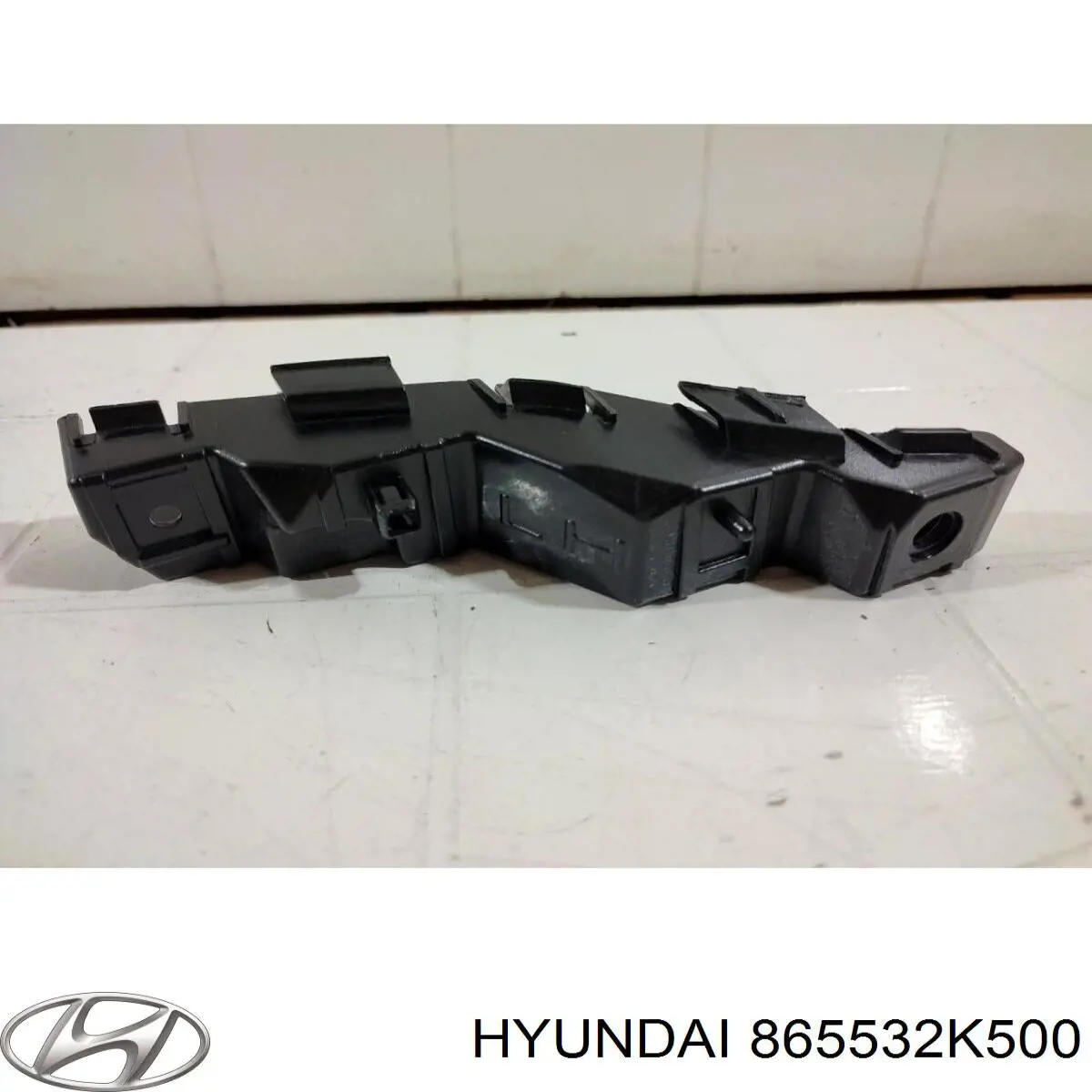 865532K500 Hyundai/Kia soporte para guardabarros delantero, izquierda delantero