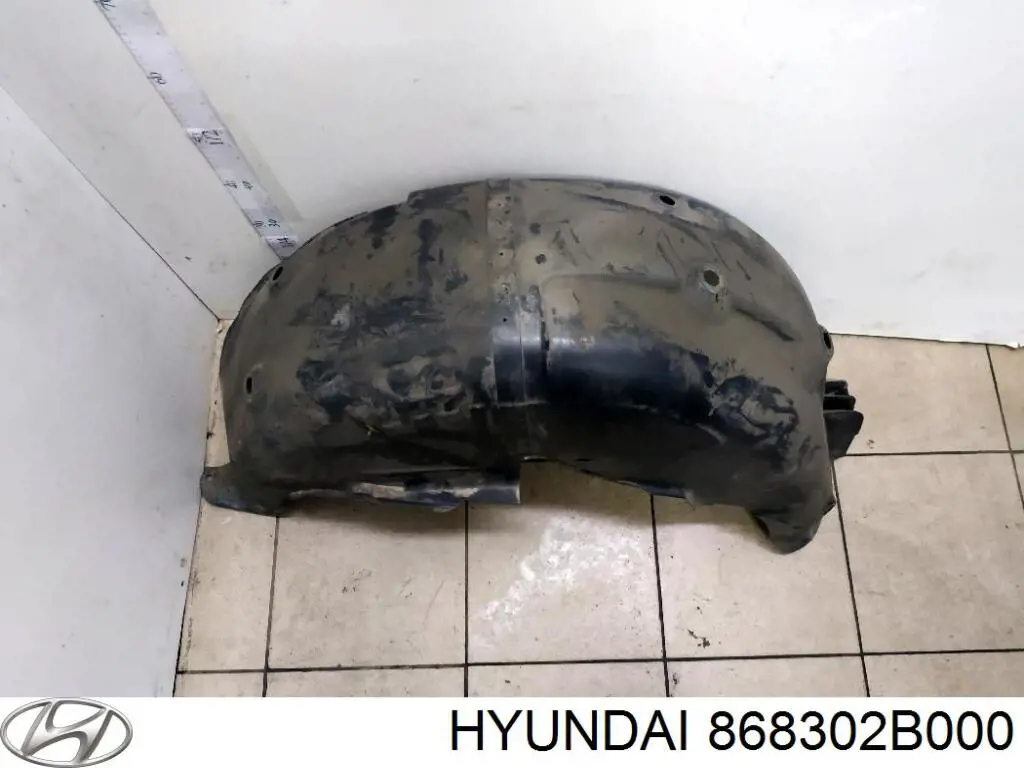 Comprar 868302B000 Hyundai/Kia Guardabarros interior izquierdo trasero