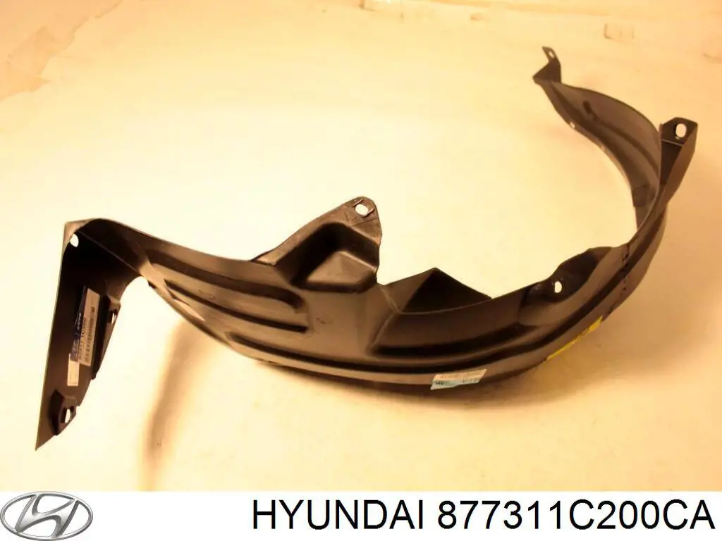 877311C200CA Hyundai/Kia moldura de guardabarro trasero izquierdo