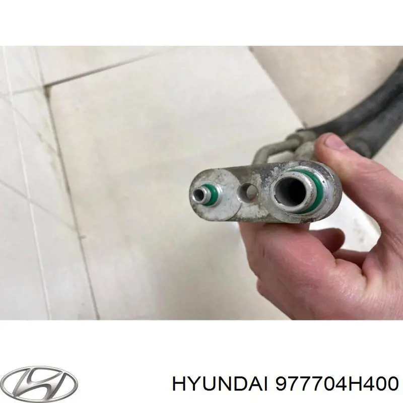 977704H000 Hyundai/Kia Manguera de aire acondicionado, del evaporador trasero al compresor