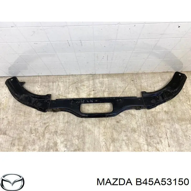 Soporte superior del radiador (panel de montaje de faros) Mazda B45A53150 precio, desde 37,28 EUR