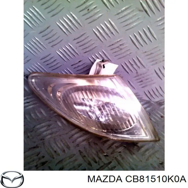 CB81510K0A Mazda faro derecho