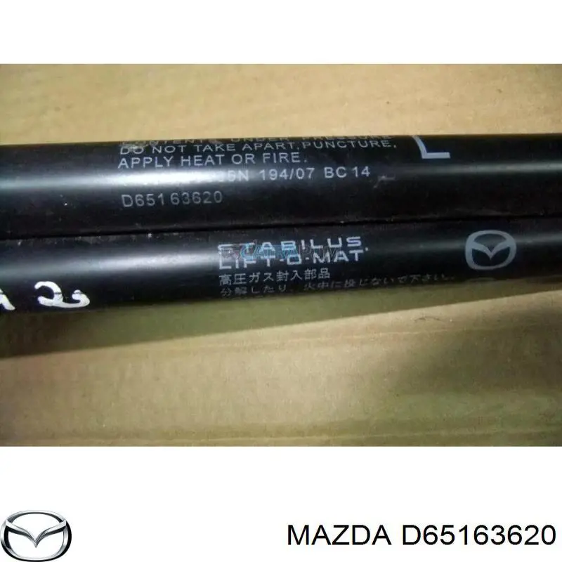 Comprar D65163620A Mazda Amortiguador de puerta trasera