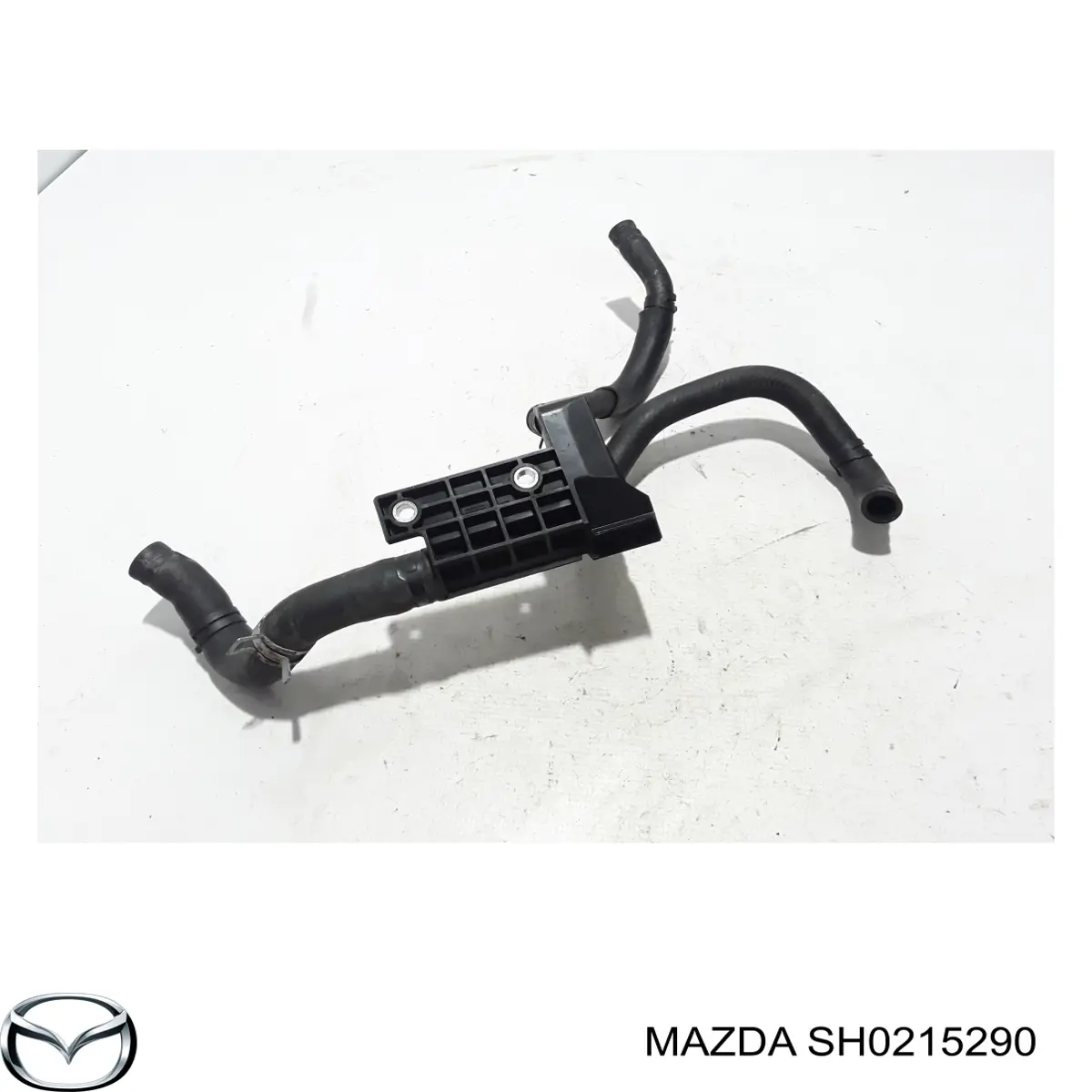 SH0215290 Mazda brida del sistema de refrigeración (triple)