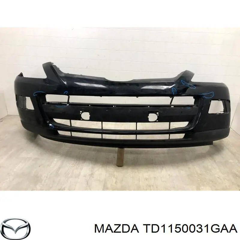 TD1150031GAA Mazda paragolpes delantero