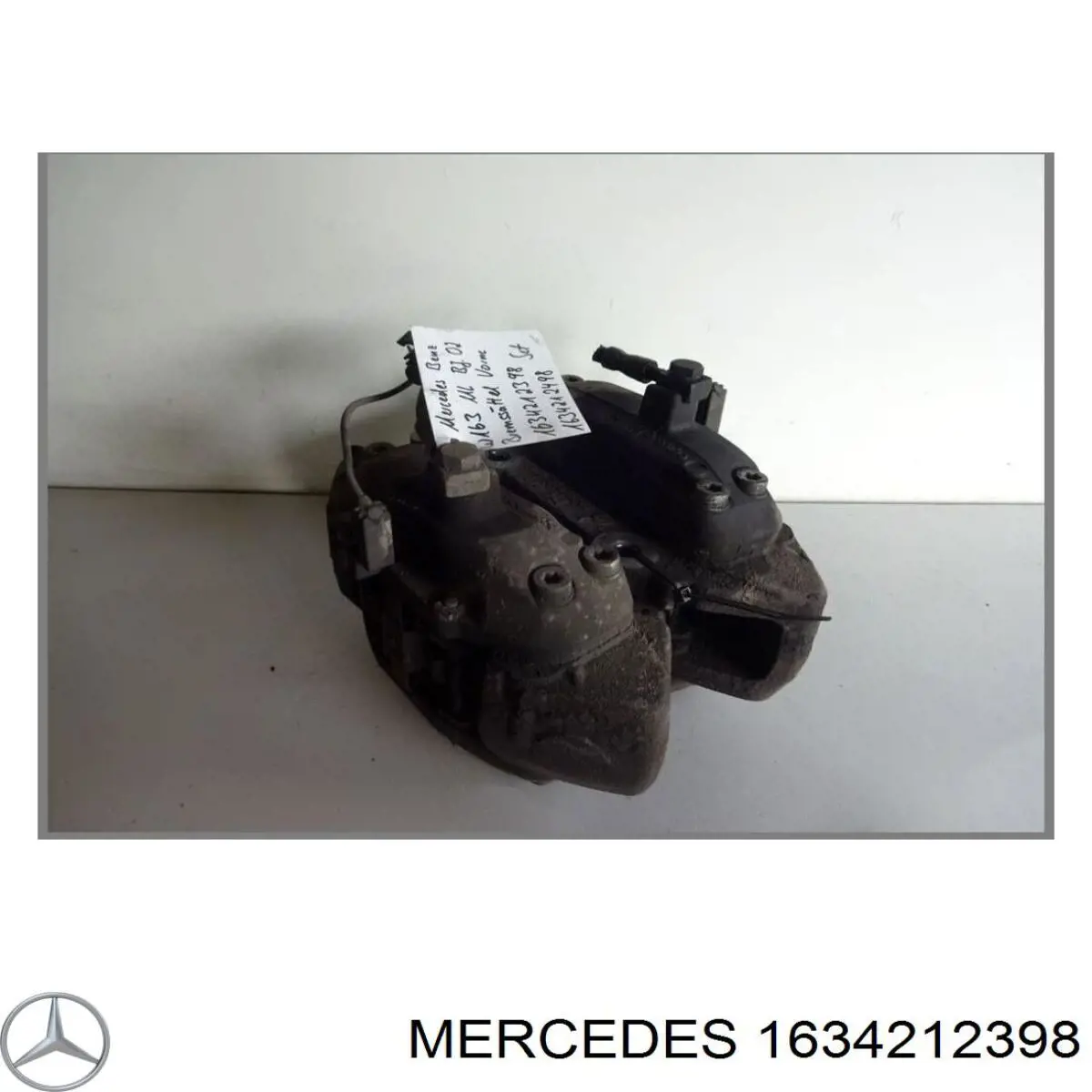 1634212398 Mercedes pinza de freno delantera izquierda