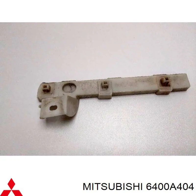 Comprar 6400A404 Mitsubishi Soporte exterior derecho del parachoques delantero