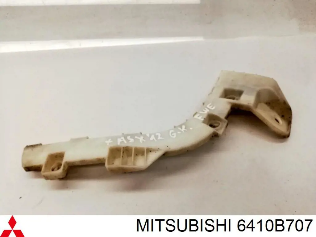 6410B707 Mitsubishi soporte de parachoques trasero izquierdo