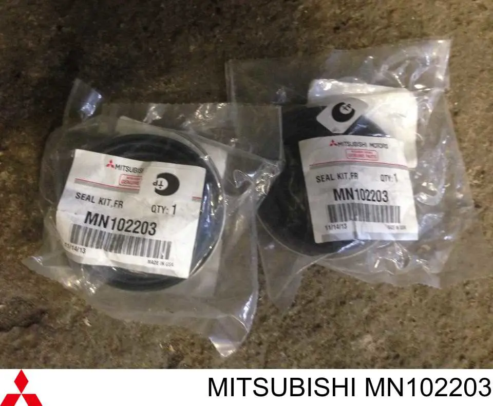 MN102203 Mitsubishi juego de reparación, pinza de freno delantero