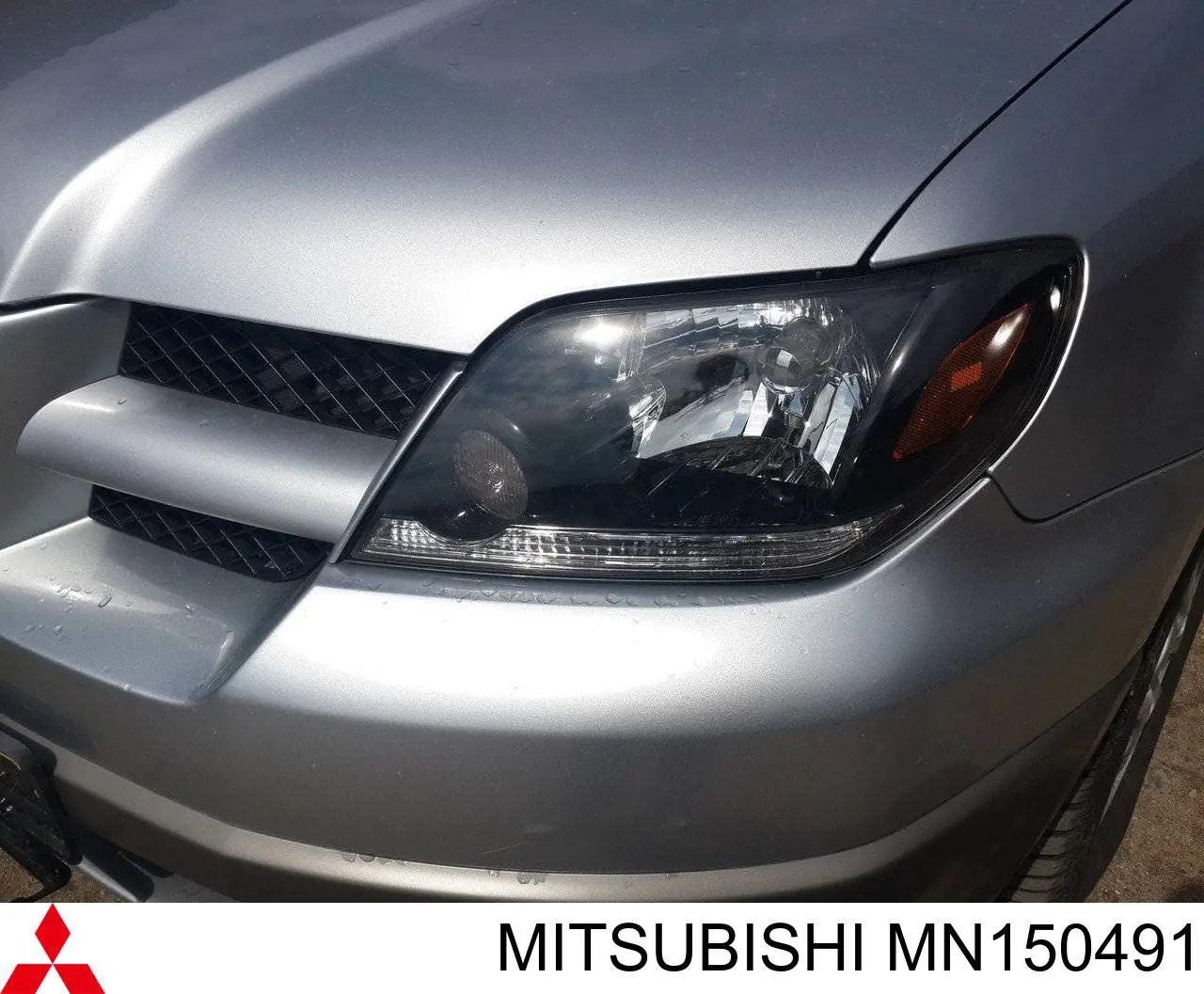 MN150491 Mitsubishi faro izquierdo