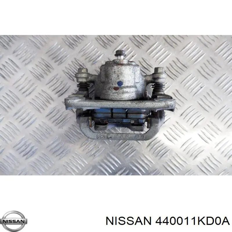 440011KD0A Nissan pinza de freno trasero derecho