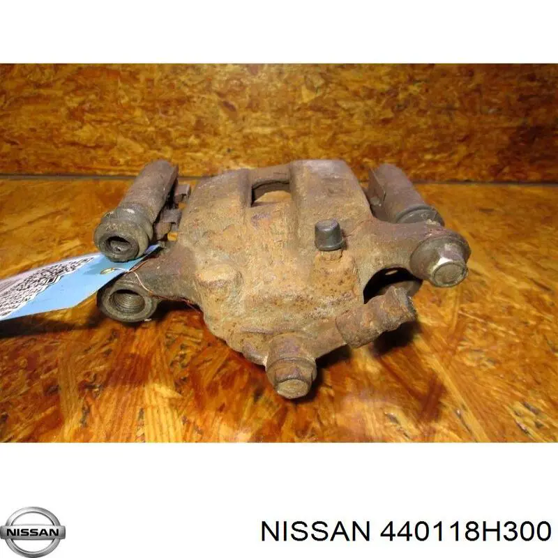 440118H300 Nissan pinza de freno trasera izquierda