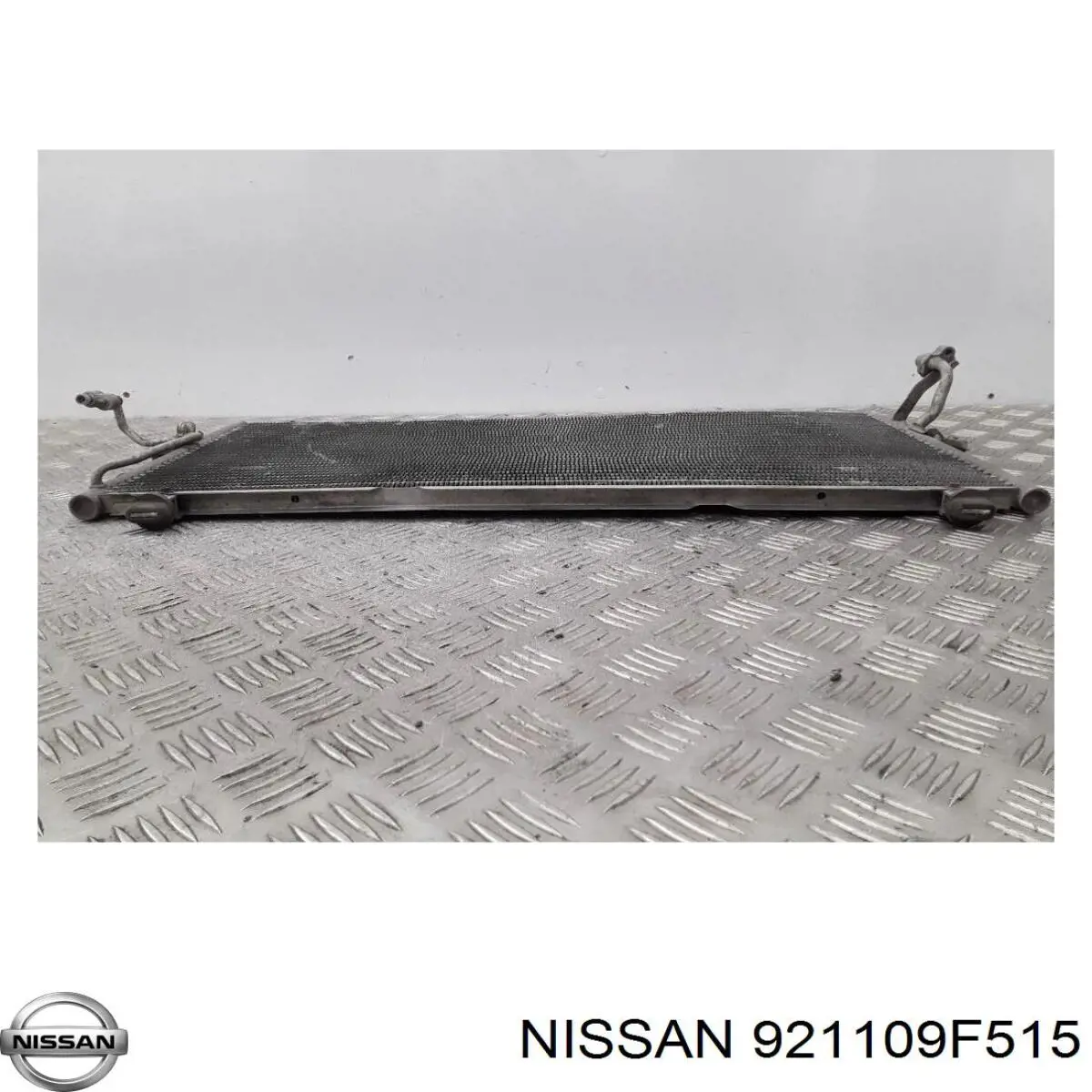 921109F515 Nissan condensador aire acondicionado