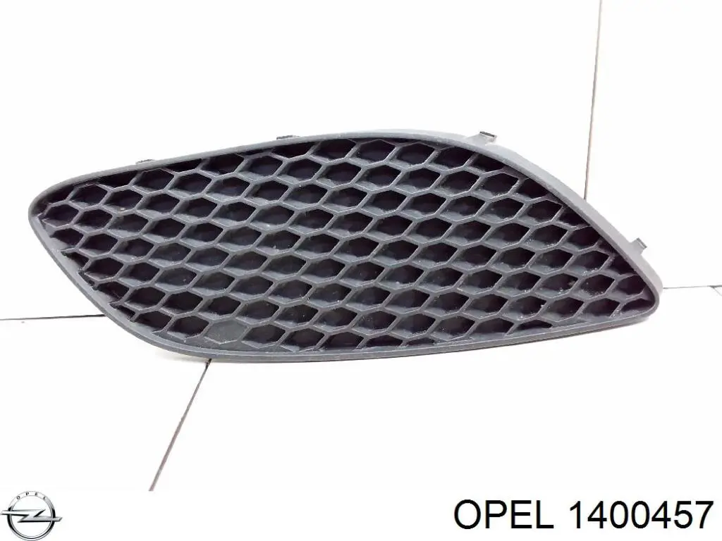 1400457 Opel rejilla de ventilación, parachoques trasero, derecha