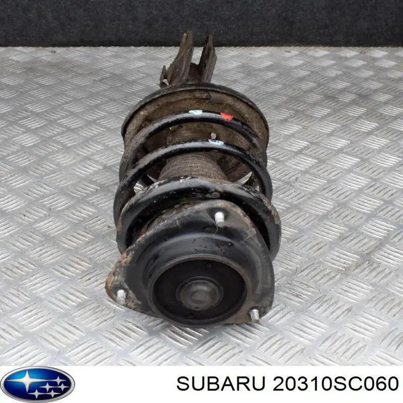 20310SC060 Subaru amortiguador delantero derecho