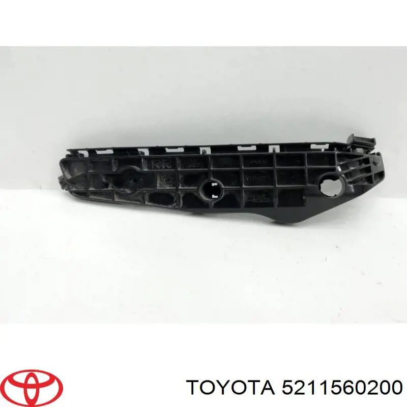 5211560200 Toyota soporte de parachoques delantero exterior derecho