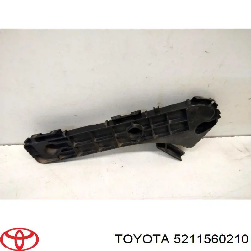 5211560210 Toyota soporte de parachoques delantero exterior derecho