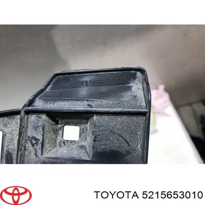 5215653010 Toyota soporte de parachoques trasero izquierdo
