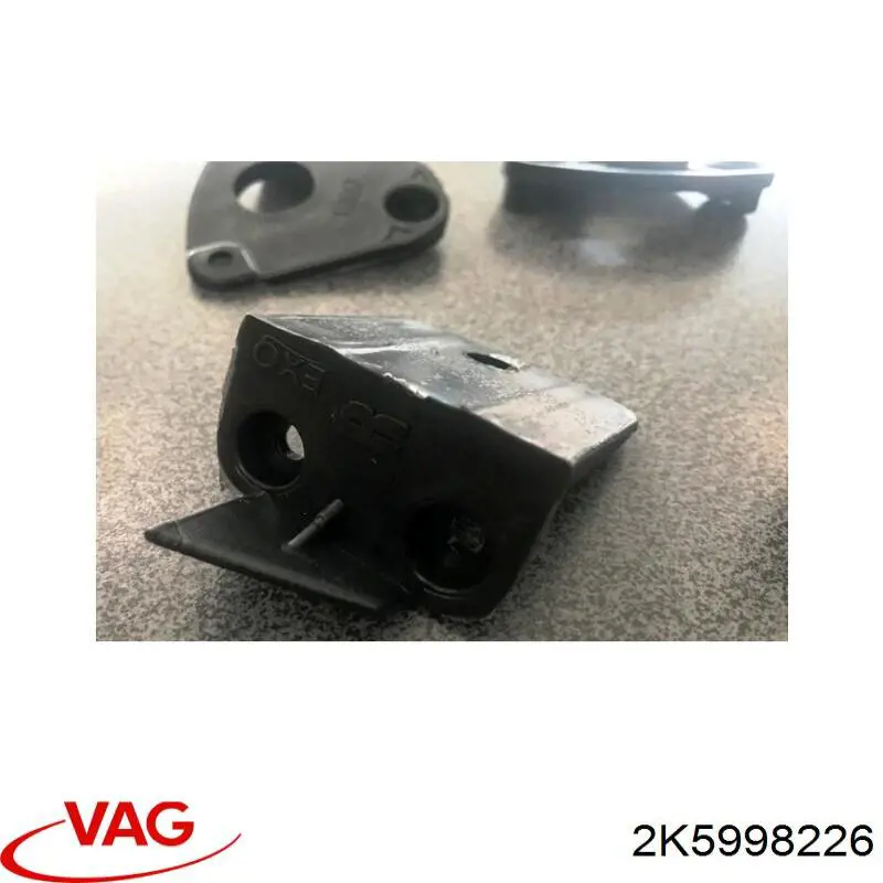 Soporte de fijación del faro delantero derecho VAG 2K5998226 precio, desde 14,84 EUR