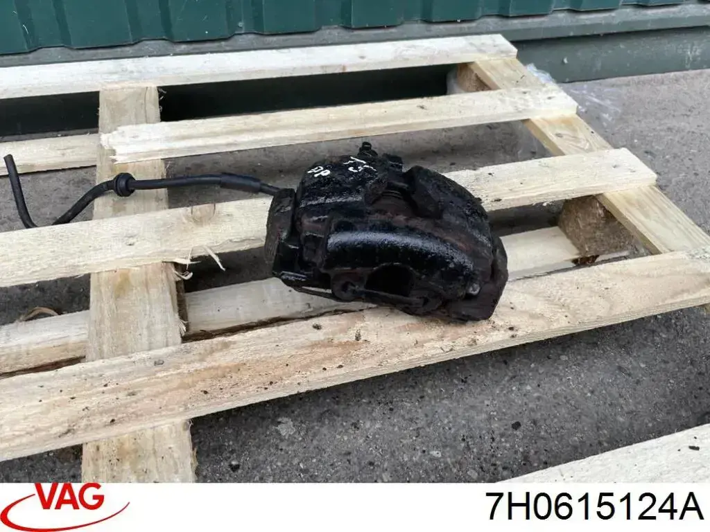 Pinza de freno delantera derecha 7H0615124A VAG
