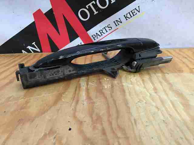 Tirador de puerta exterior delantero 6921058010 Toyota/Lexus