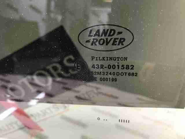 Luna de puerta trasera izquierda CVB000051 Land Rover