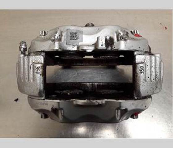 Pinza de freno delantera izquierda A0034205183 Mercedes