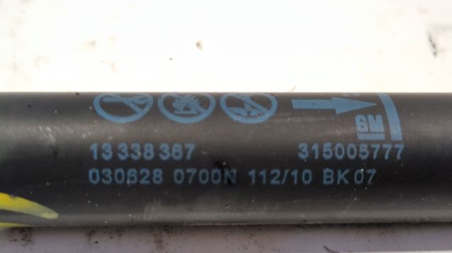Amortiguador de puerta trasera 13338367 OPEL