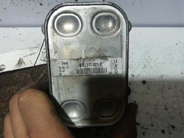 03L117021C VAG Radiador de aceite debajo del filtro  disponible Alicante