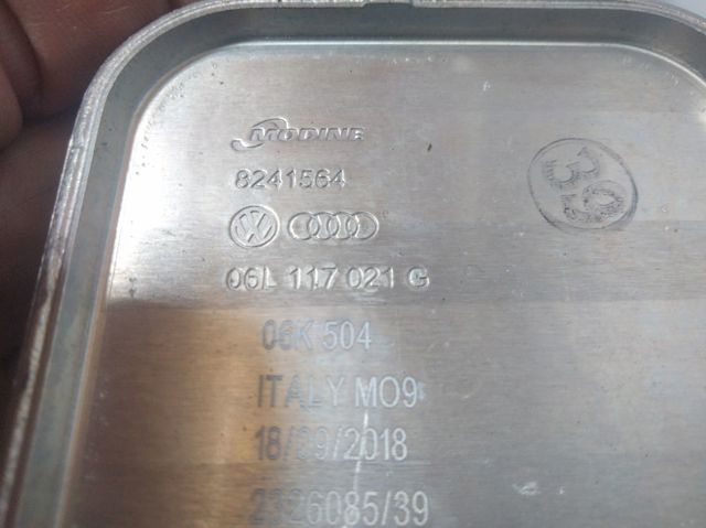 Radiador de aceite debajo del filtro 06L117021G VAG