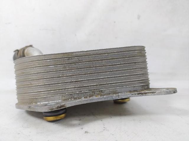 06B117021 VAG Radiador de aceite debajo del filtro  comprar en Lleida