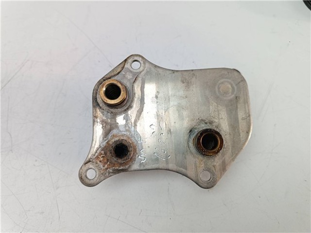 06B117021 VAG Radiador de aceite debajo del filtro comprar Madrid