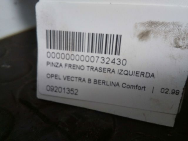 Pinza de freno trasera izquierda 09201352 OPEL