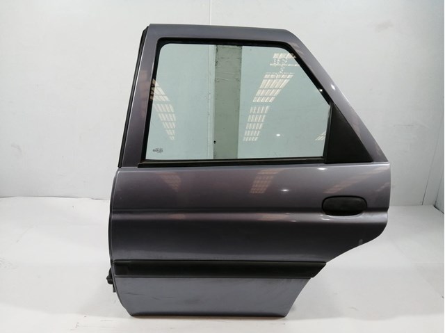 Panel exterior de puerta trasera izquierda 1055098 Ford