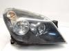 Faros delantero izquierdo 1216561 OPEL