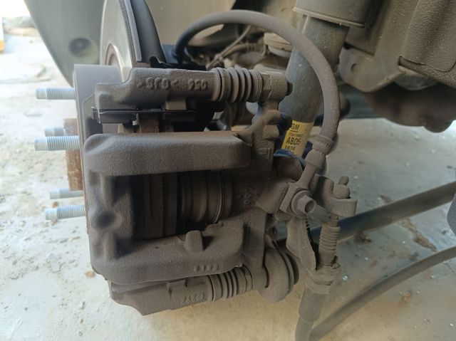 Pinza de freno trasera izquierda 13300885 OPEL