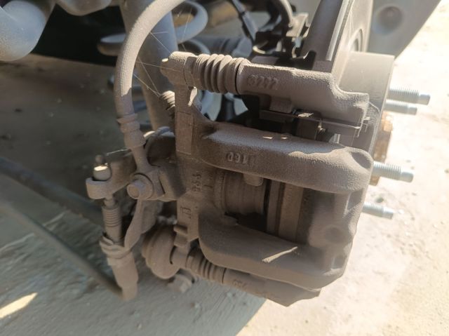 Pinza de freno trasera derecha 13300886 OPEL