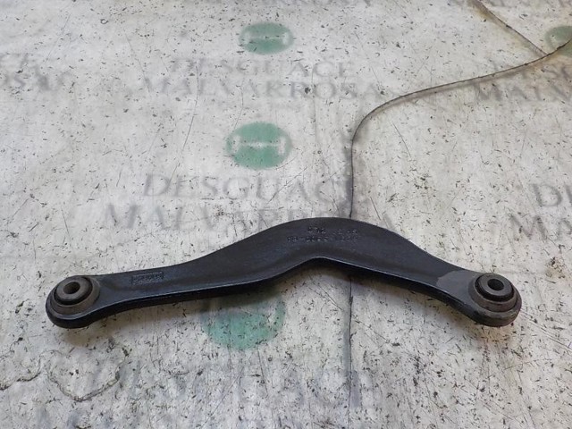 1457609 FORD Brazo superior de suspensión trasera izquierdo/derecho comprar Bilbao
