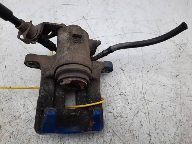Pinza de freno trasera izquierda 1J0615423 VAG