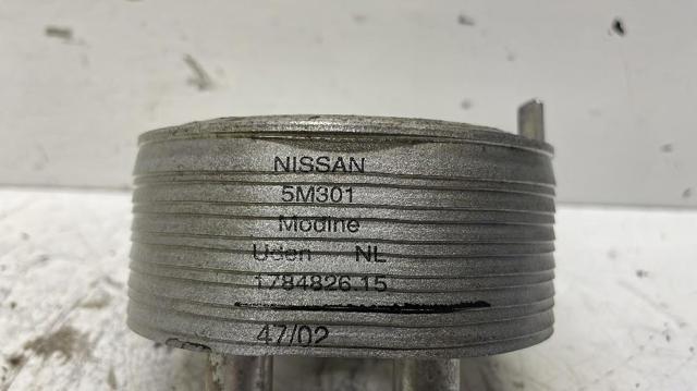 213055M301 NISSAN Radiador de aceite debajo del filtro  en stock Gandía