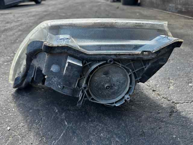 Faro derecho Nissan Navara D40